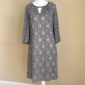 Madison Leigh Dress in black/white stripes. Light pink slip lining. NWOT. Size 8